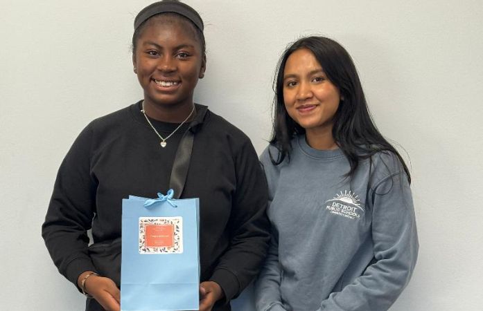  teen girl and an adult female standing